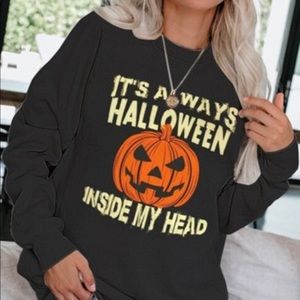 Creneck Halloween sweatshirt.size small and M
